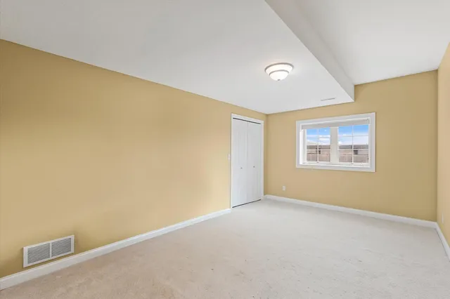 a view of a swimming pool with an ocean view