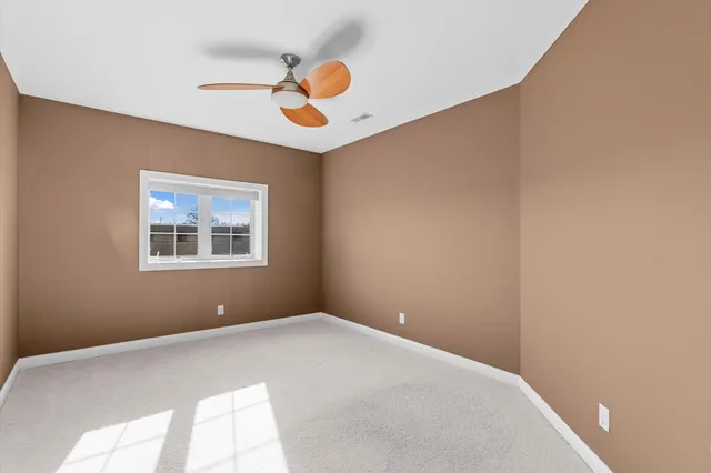 a view of a swimming pool with an ocean view