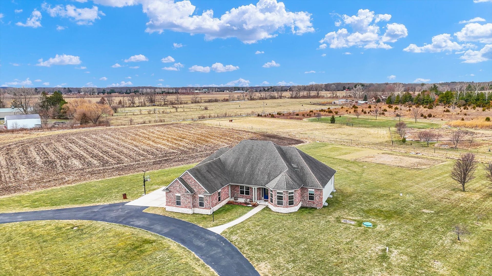 2595 500 East Mahomet, IL 61853 - Photo 66 of 84 a view of a swimming pool with an ocean view