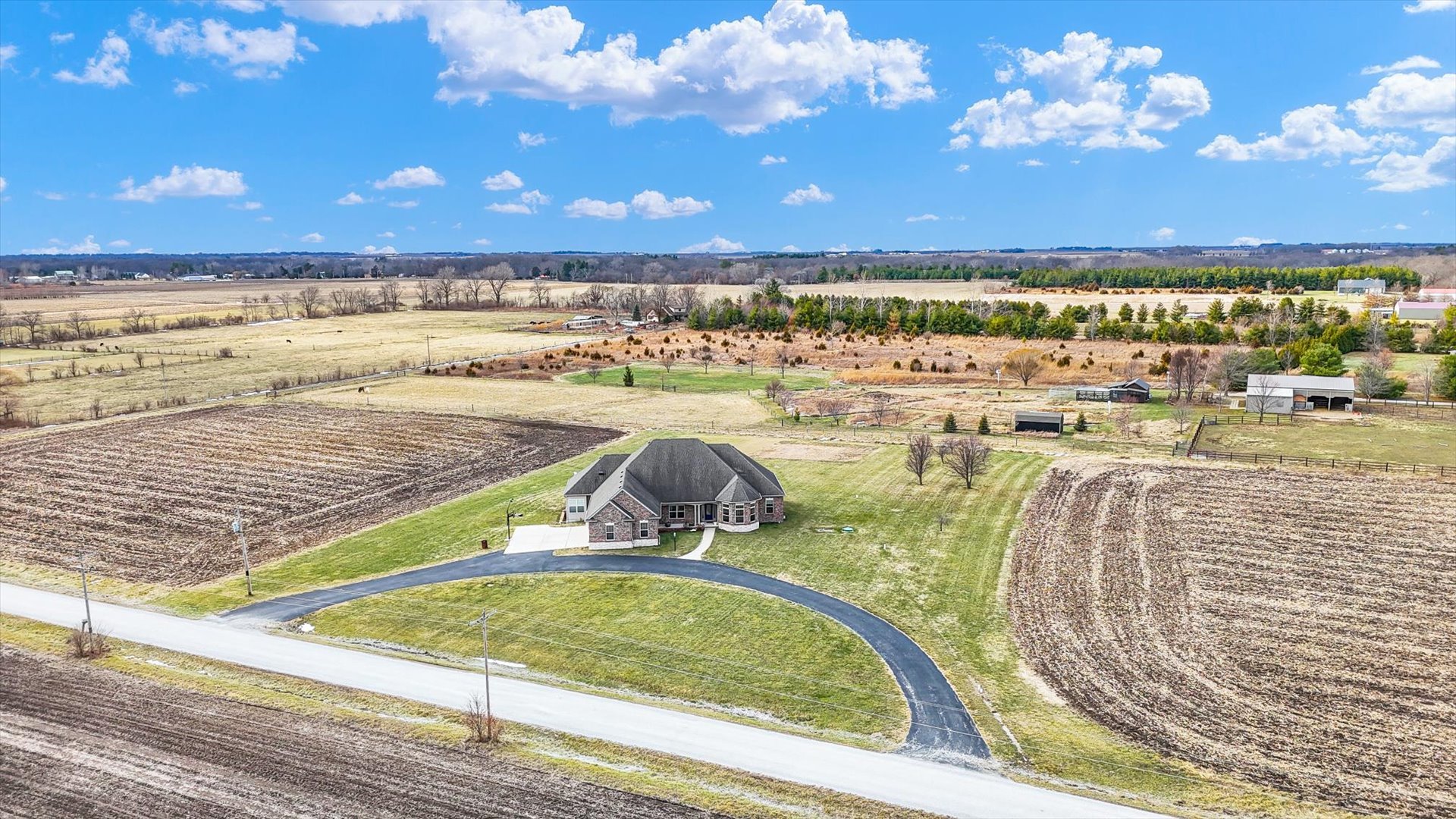 2595 500 East Mahomet, IL 61853 - Photo 73 of 84 a view of a swimming pool with an ocean view