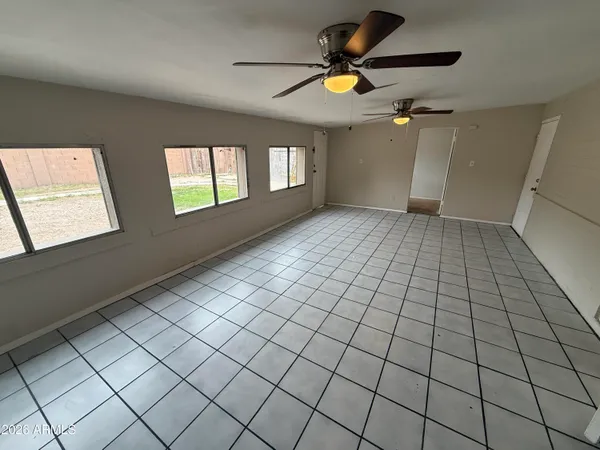 a view of an empty room and window