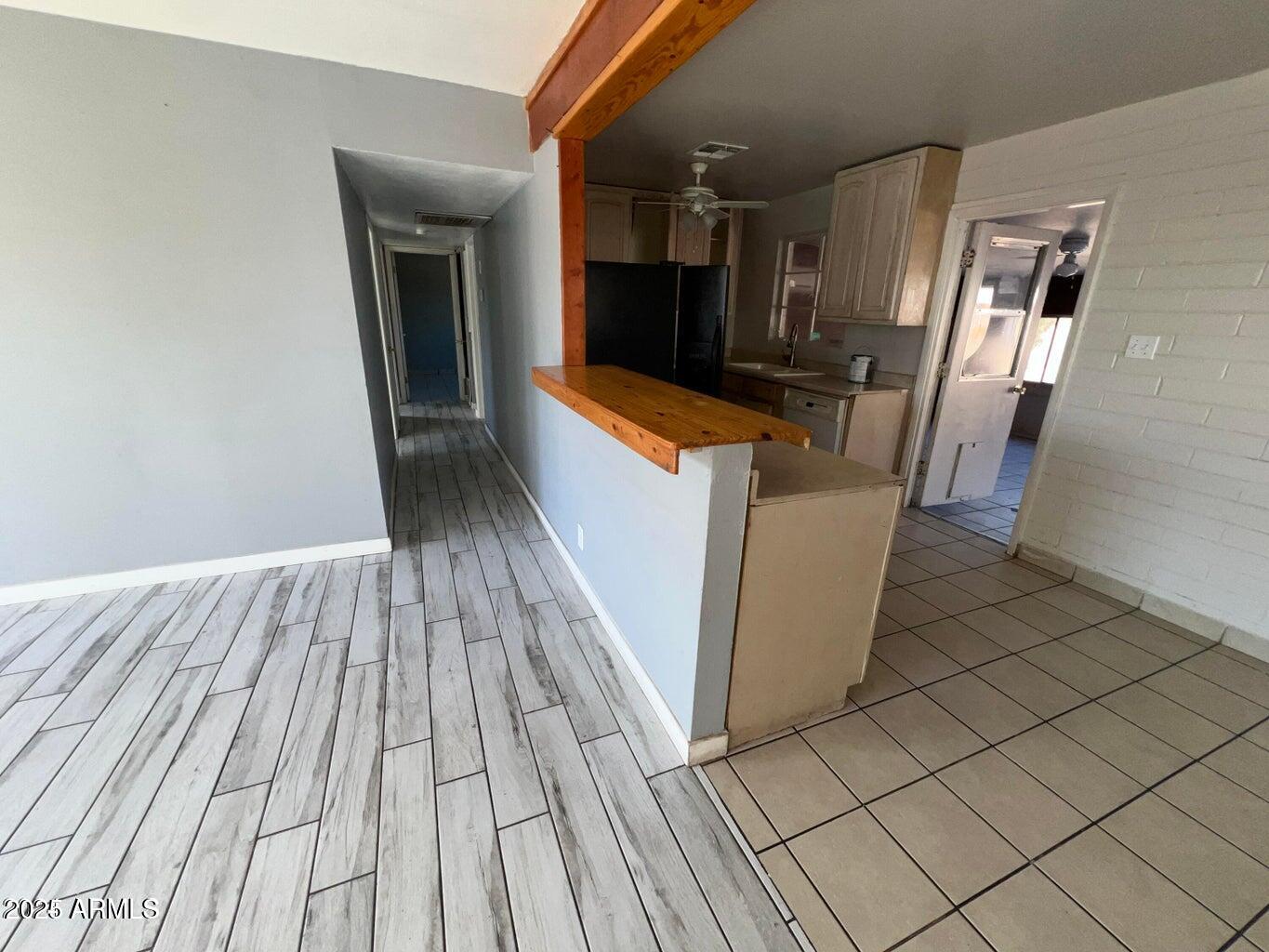 10244 North 18th Avenue Phoenix, AZ 85021 - Photo 3 of 4 a view of a kitchen from the hallway