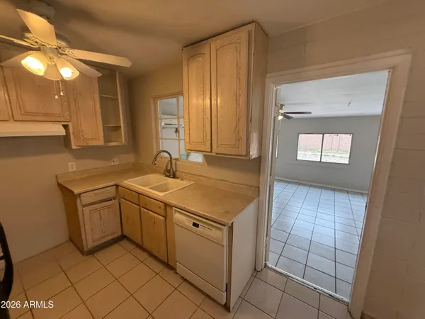 a bathroom with a sink vanity and a mirror