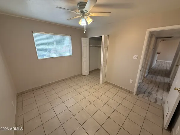 a view of an empty room and window