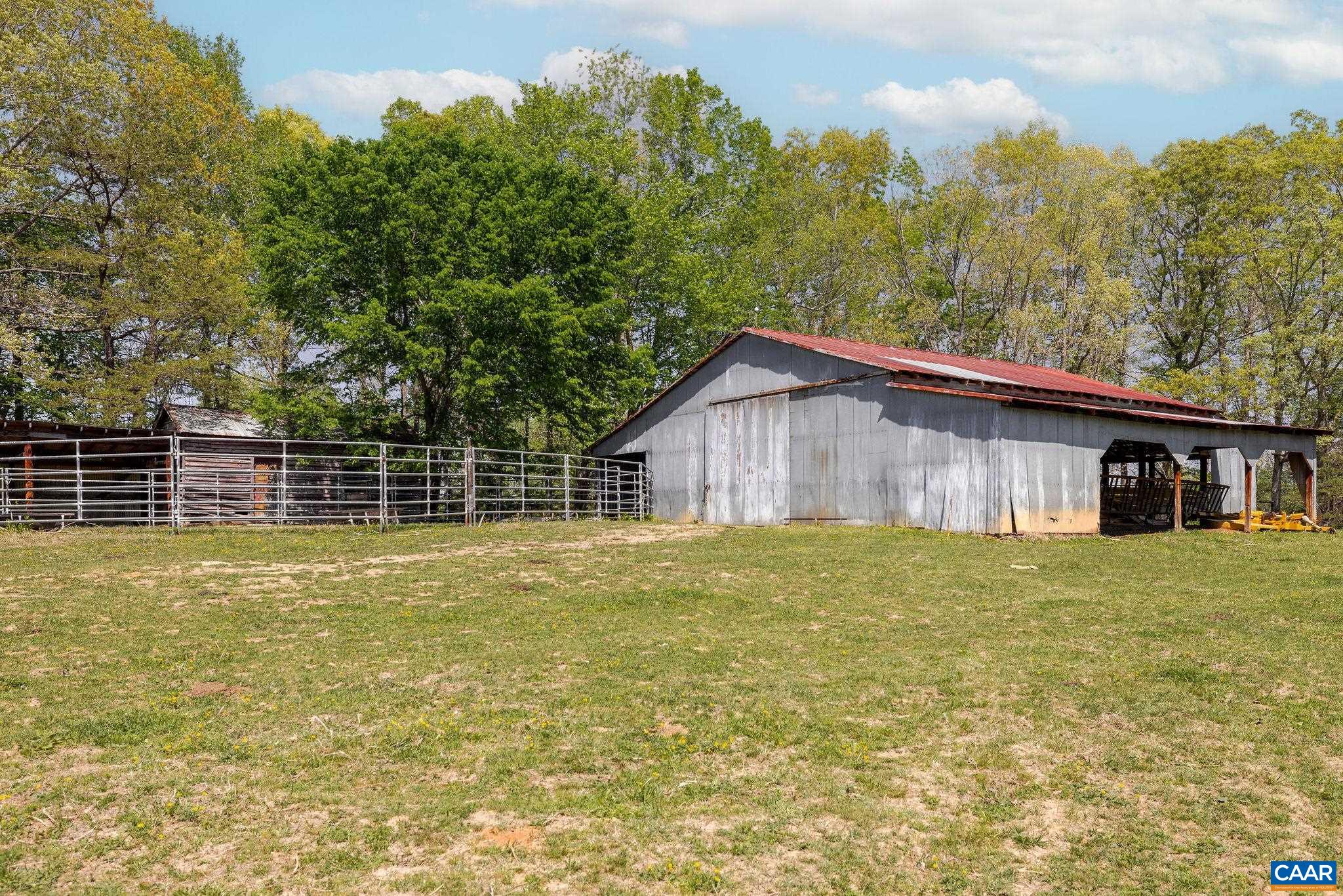 Tbd Cedar Plains Road Sandy Hook, VA 23153 - Photo 12 of 55 a view of an house with backyard space and balcony