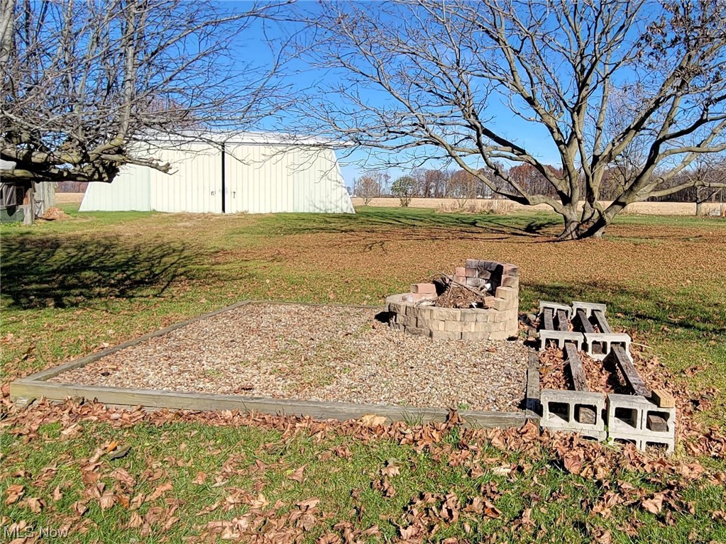 405 Bryan Road Milan, OH 44846 - Photo 28 of 35 View of yard with a fire pit