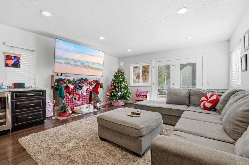 25252 Misty Ridge Mission Viejo, CA 92692 - Photo 16 of 42 a living room with furniture and a flat screen tv