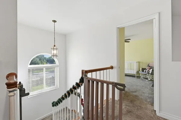 a view of hallway with a window