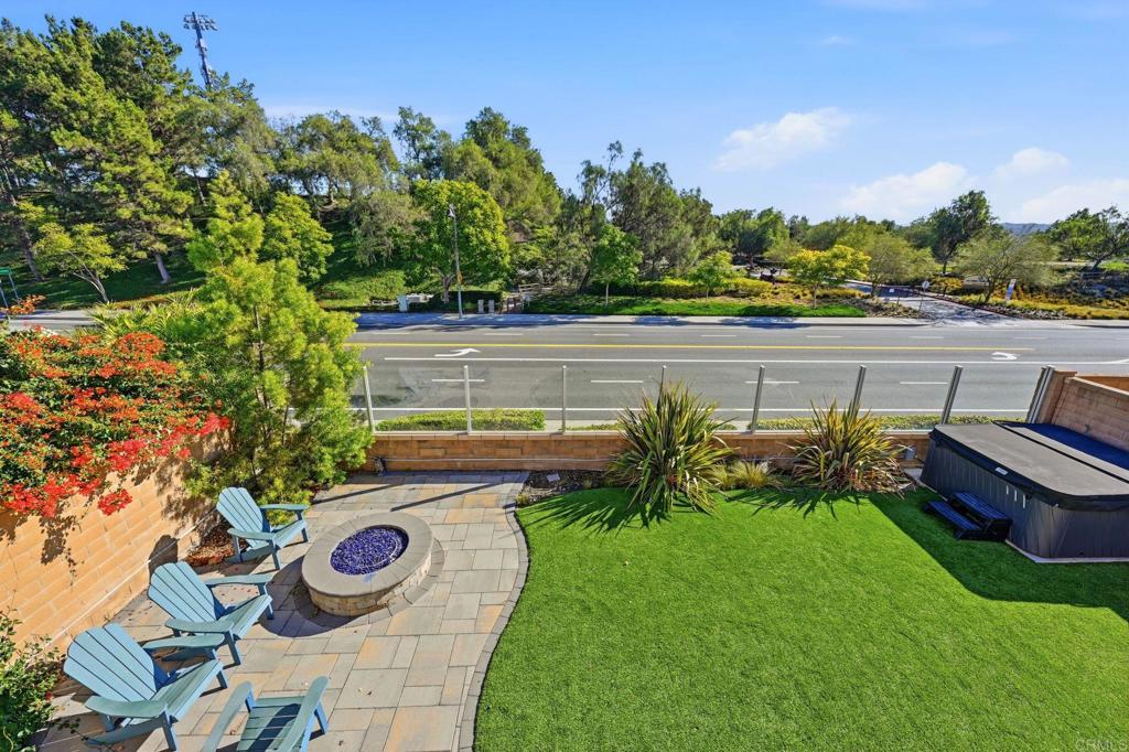 25252 Misty Ridge Mission Viejo, CA 92692 - Photo 29 of 42 a view of a chair and tables in the garden