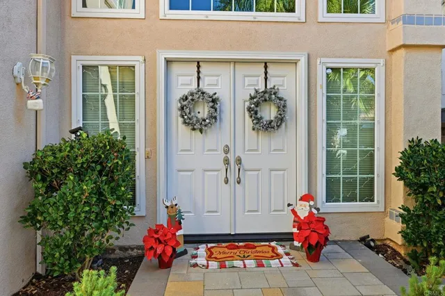 a vase of flowers sitting on a floor