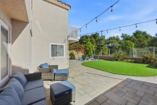 a outdoor living space with furniture and garden