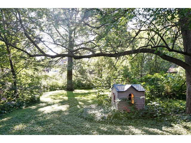Undisclosed Address Western Springs, IL 60558 - Photo 5 of 7 a backyard of a house with a yard and outdoor seating