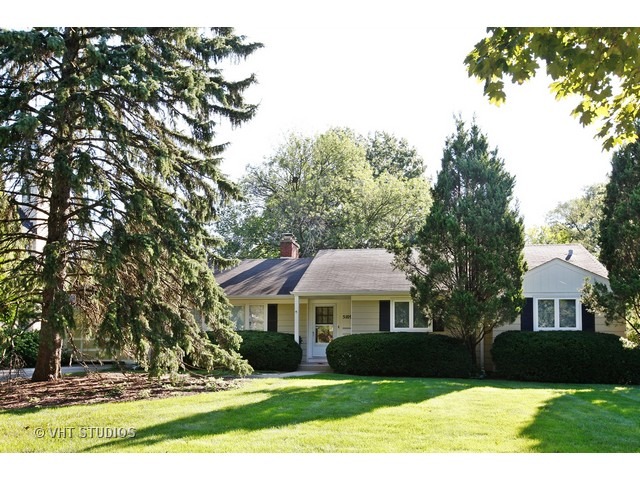 Undisclosed Address Western Springs, IL 60558 - Photo 7 of 7 a front view of a house with a yard