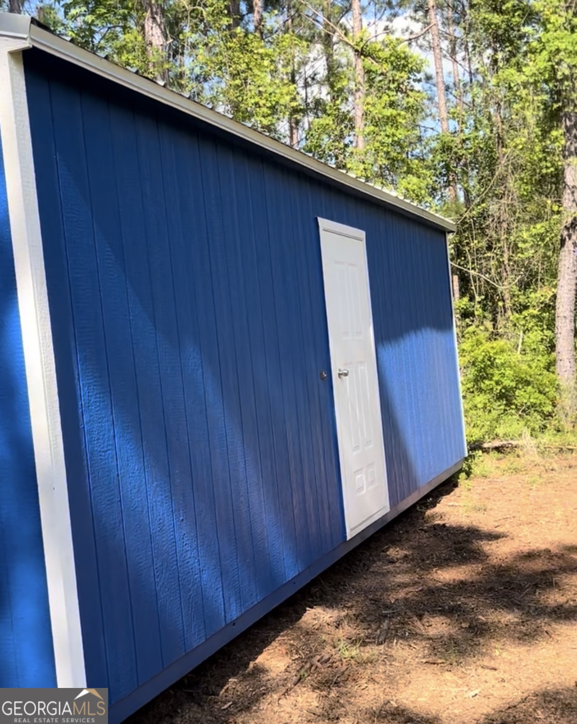 29 Tarpley Road Danville, GA 31017 - Photo 3 of 6 a view of a wooden door in front of a house