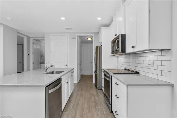 $519,000 | 14559 Edgewater Circle, Naples, FL 34114