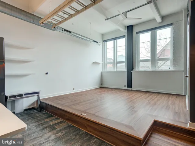 a view of an empty room and window