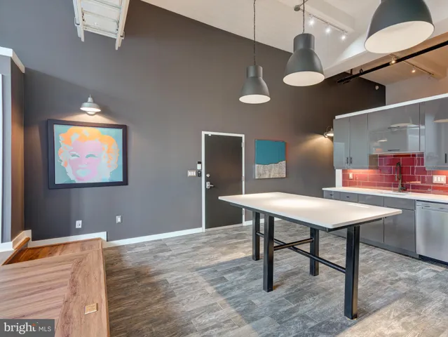 a room with furniture and a chandelier