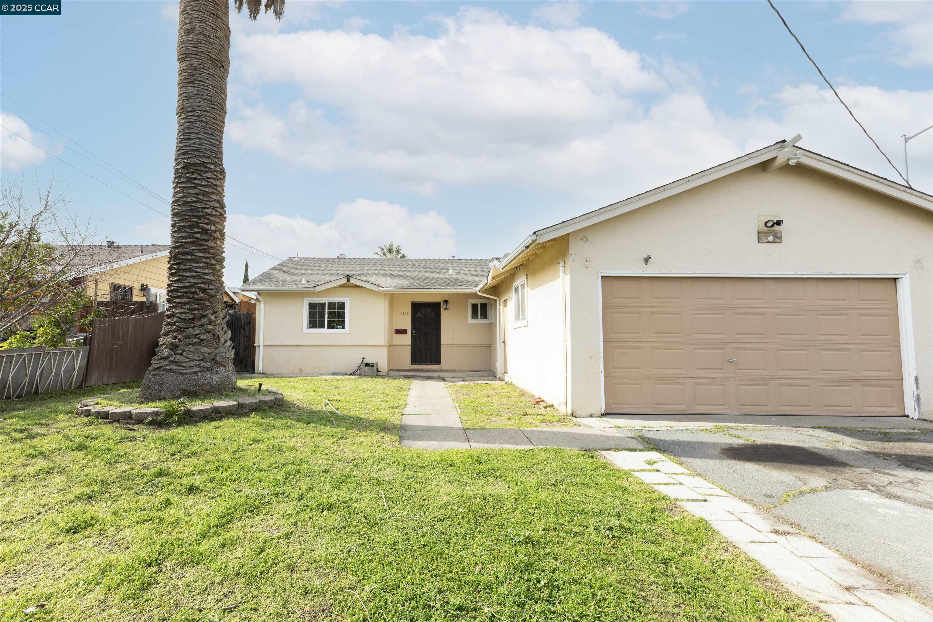 2106 Goff Avenue Pittsburg, CA 94565 - Photo 26 of 27 a front view of a house with a yard