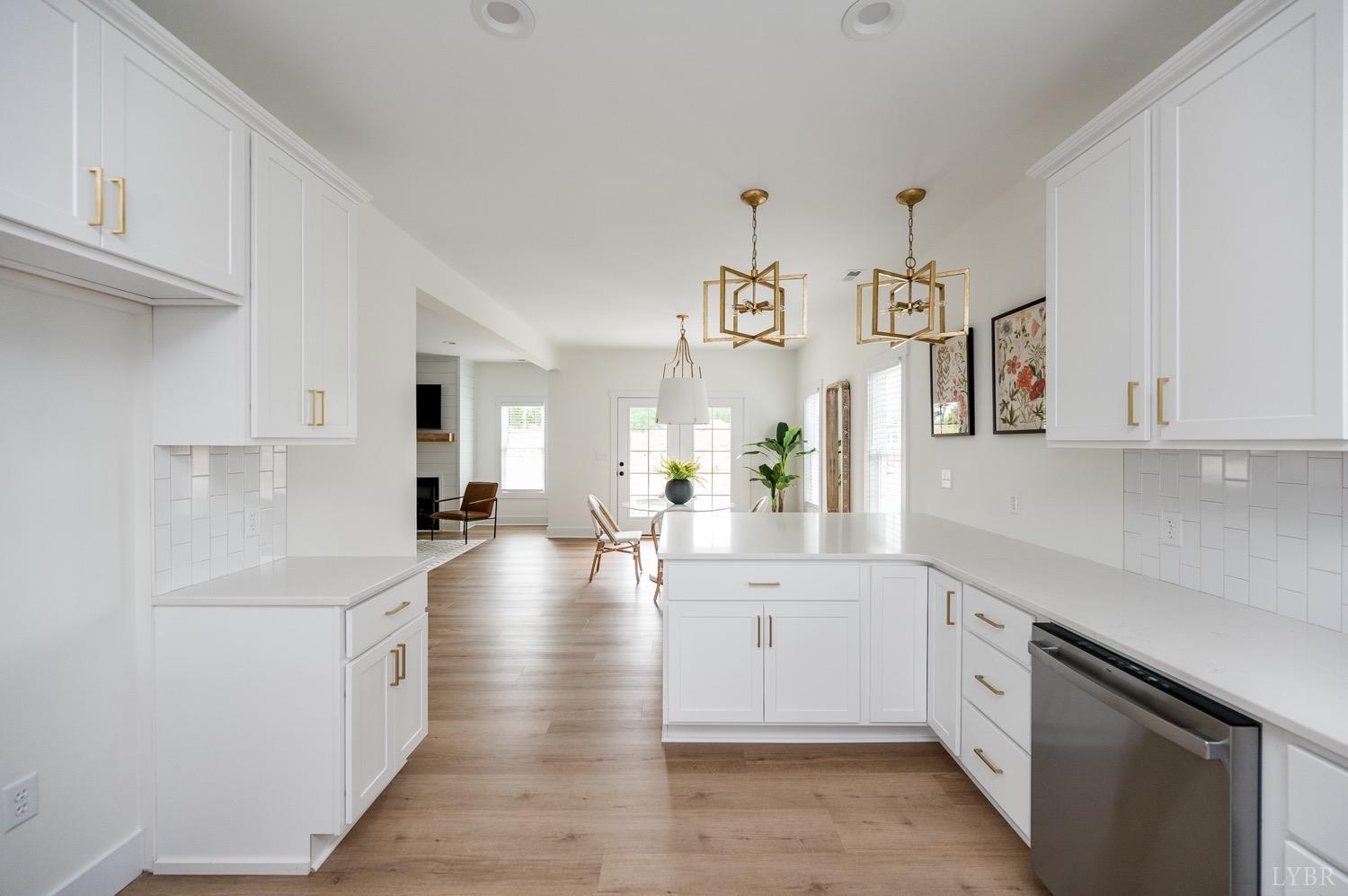 574 Leesville Road Lynchburg, VA 24502 - Photo 20 of 54 a large white kitchen with cabinets