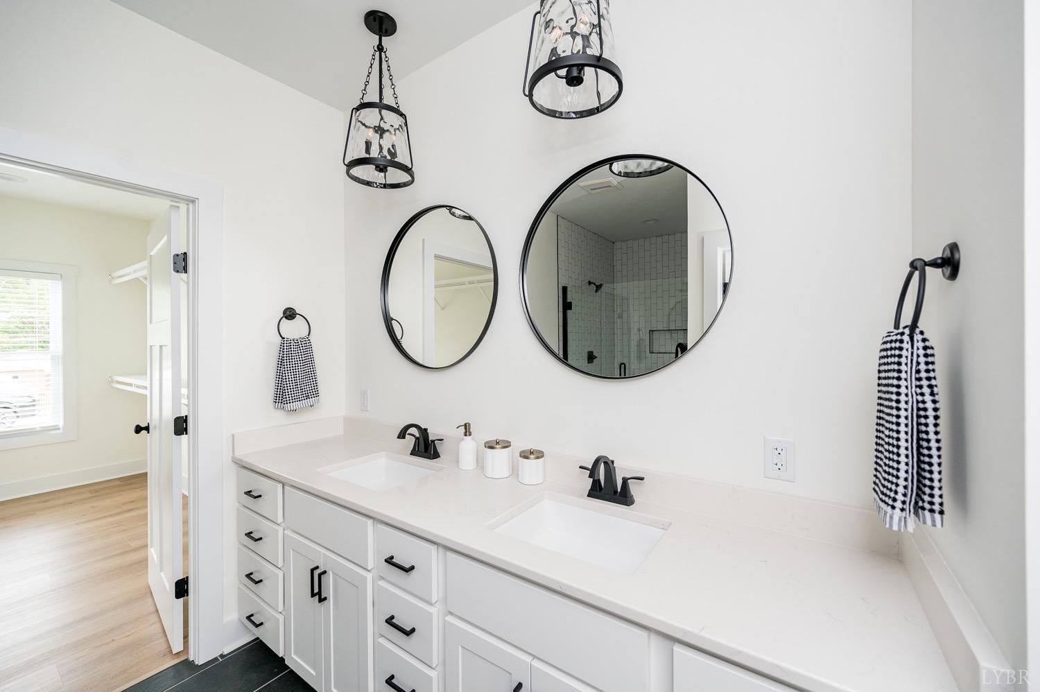 574 Leesville Road Lynchburg, VA 24502 - Photo 27 of 54 a bathroom with a sink and a mirror