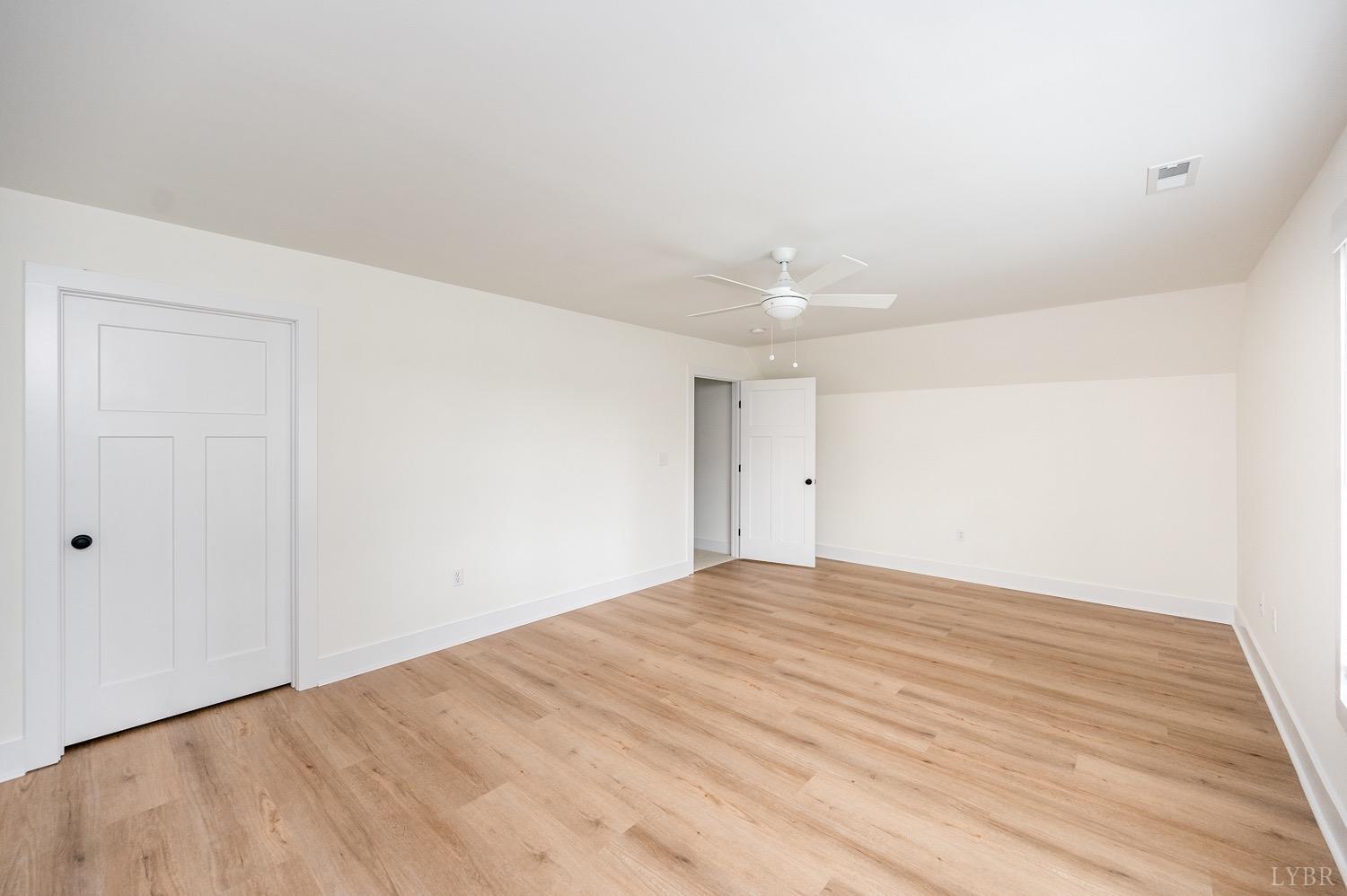 574 Leesville Road Lynchburg, VA 24502 - Photo 47 of 54 a view of empty room with wooden floor