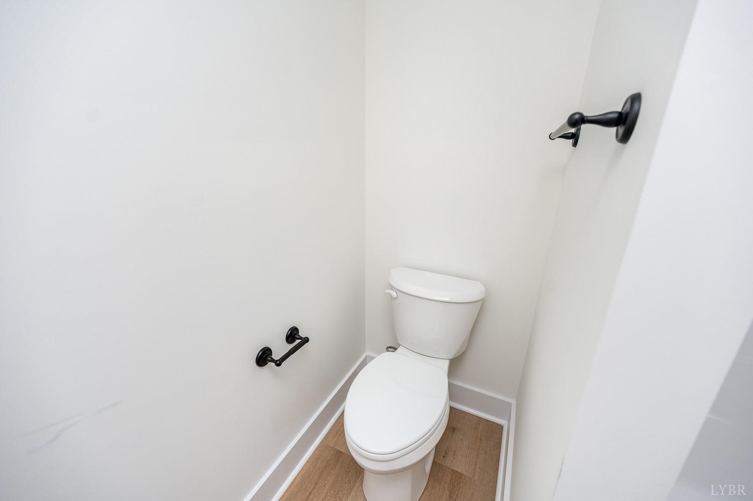 574 Leesville Road Lynchburg, VA 24502 - Photo 50 of 54 a white toilet sitting next to a white wall