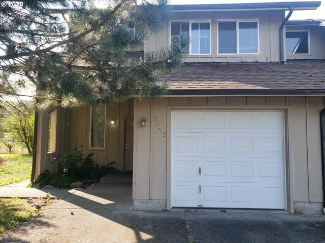 a house view with a outdoor space