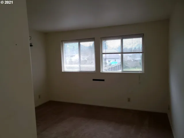 an empty room with a window