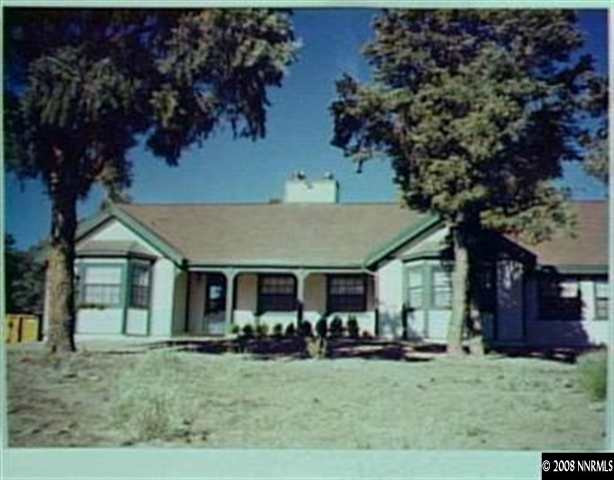front view of a house with that has a garden