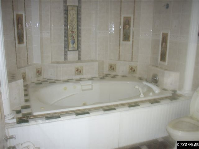 1040 Hamilton Road Reno, NV 89521 - Photo 5 of 9 a bathroom with a sink and a mirror