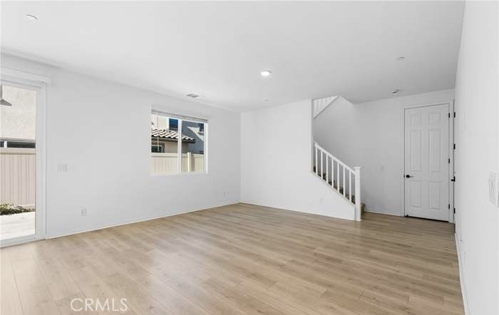 24119 Ashton Corona, CA 92883 - Photo 23 of 45 a view of an empty room with a window