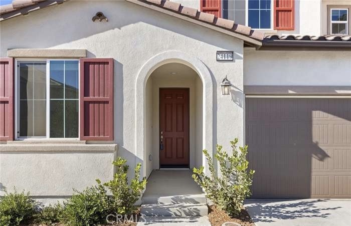 24119 Ashton Corona, CA 92883 - Photo 3 of 45 a view of a door of the house