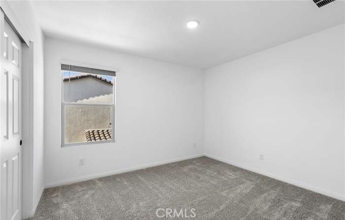 24119 Ashton Corona, CA 92883 - Photo 38 of 45 an empty room with a window