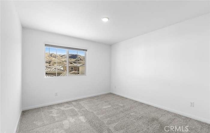 24119 Ashton Corona, CA 92883 - Photo 39 of 45 an empty room with a window