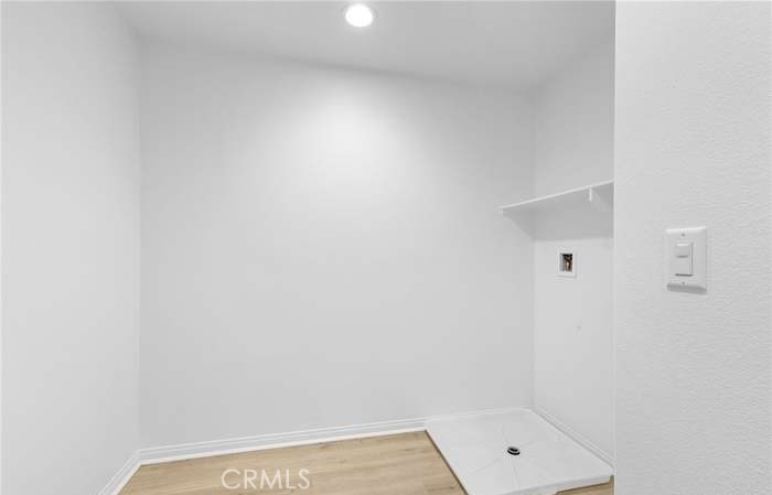 24119 Ashton Corona, CA 92883 - Photo 45 of 45 a bathroom with a shower and toilet