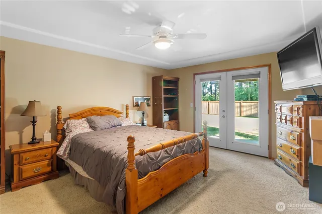 a bathroom with a tub and a shower