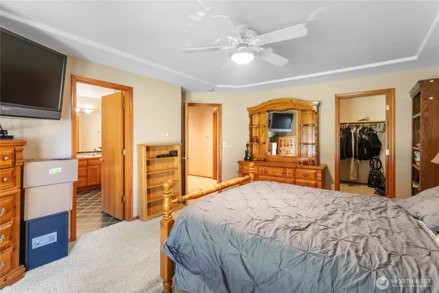 a very nice looking room with a large window and front door