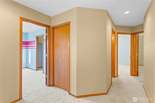 a balcony with wooden floor and fence