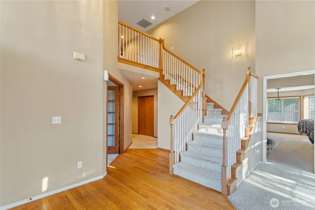 a kitchen with stainless steel appliances granite countertop a refrigerator stove and oven