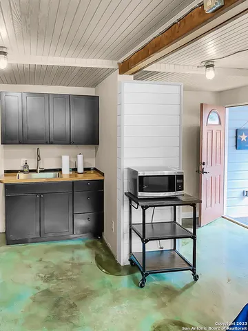 a bathroom with a toilet a sink and bathtub