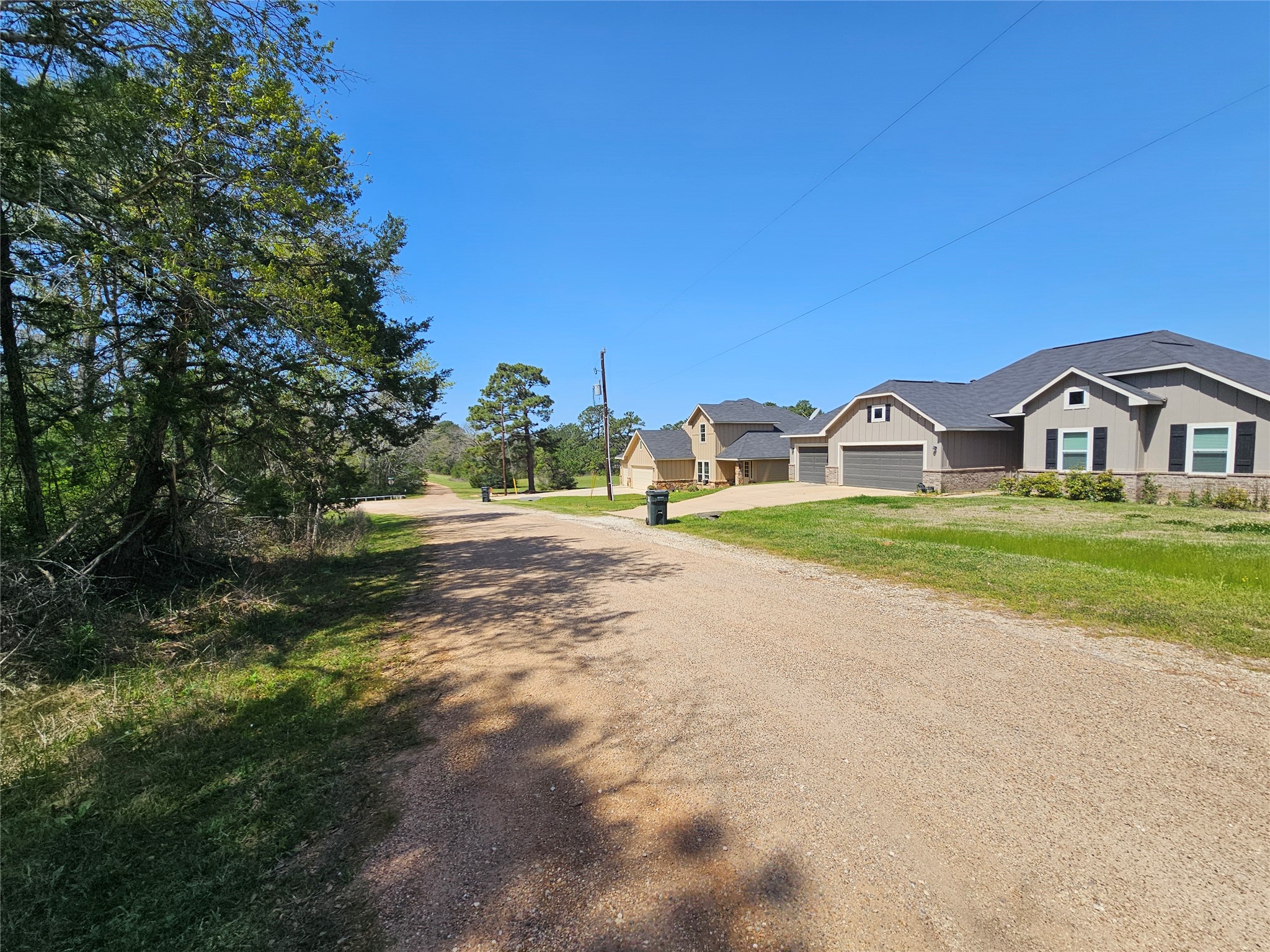 0 Park View Drive Hempstead, TX 77445 - Photo 5 of 9 a view of house with garden and tall trees