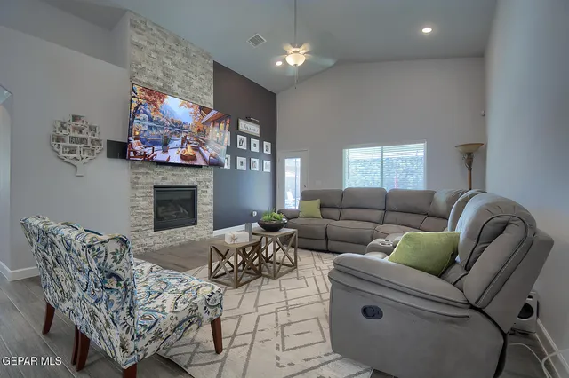 a stove top oven sitting inside of a kitchen