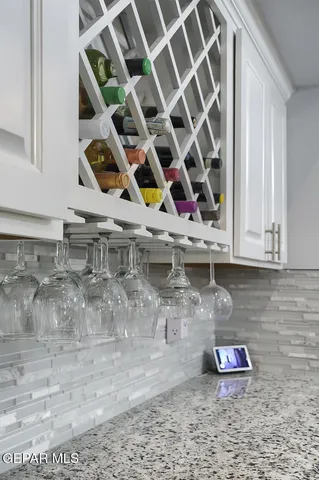 a swimming pool with yard in front of it