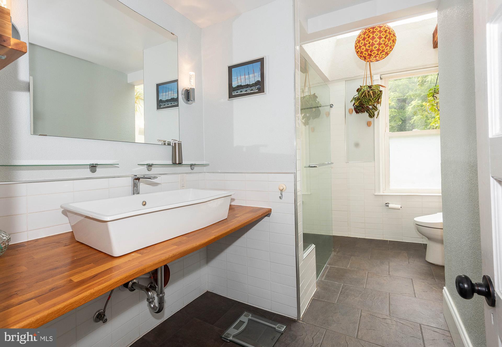 8316 Dock Road Pasadena, MD 21122 - Photo 33 of 74 Remodeled Full Bath with heated tile floors