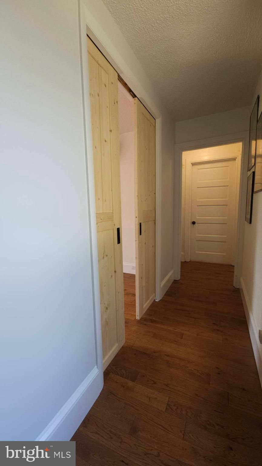 8316 Dock Road Pasadena, MD 21122 - Photo 44 of 74 Bedroom 3 with beautiful wood pocket doors