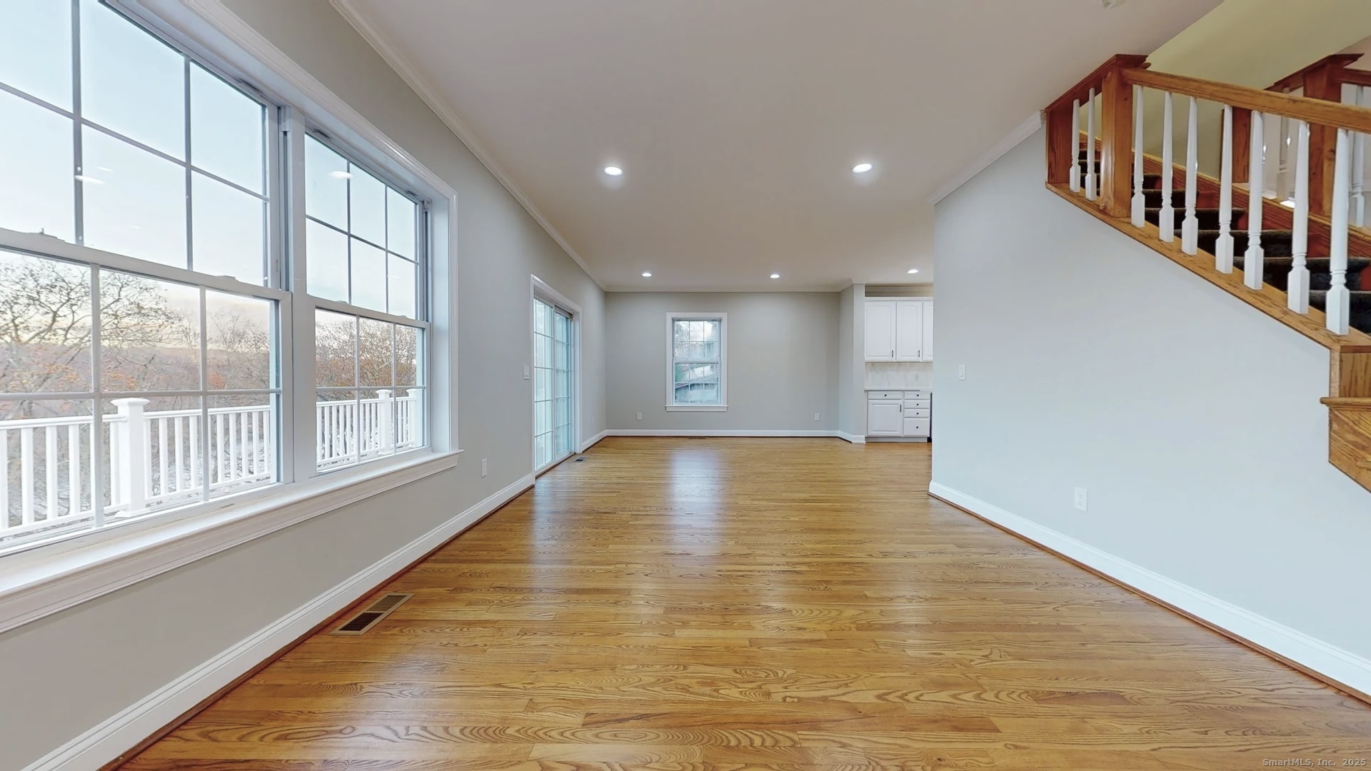 112 River Road Shelton, CT 06484 - Photo 11 of 37 a view of an empty room with wooden floor and a window