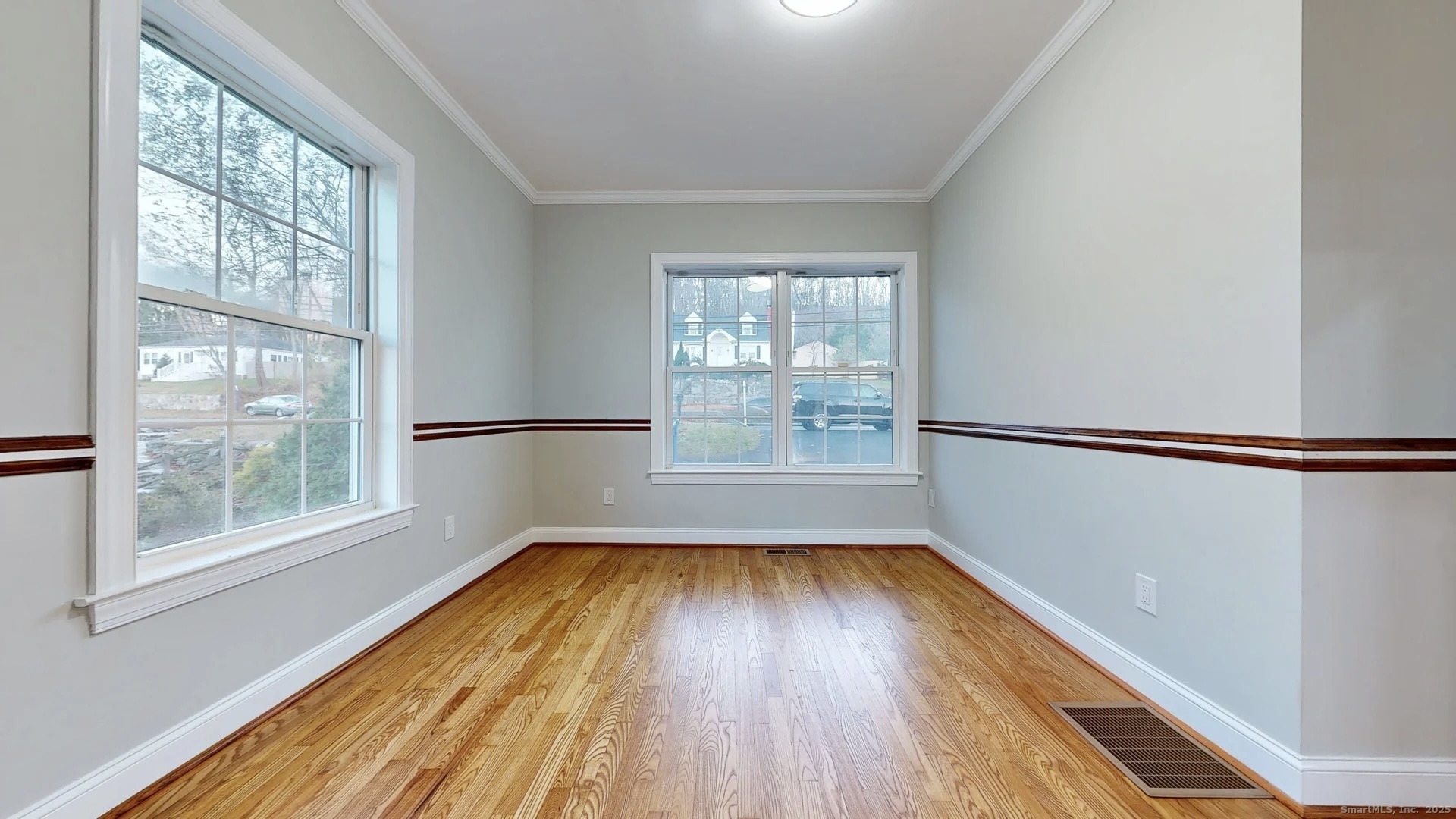 112 River Road Shelton, CT 06484 - Photo 18 of 37 a view of empty room with wooden floor and fan