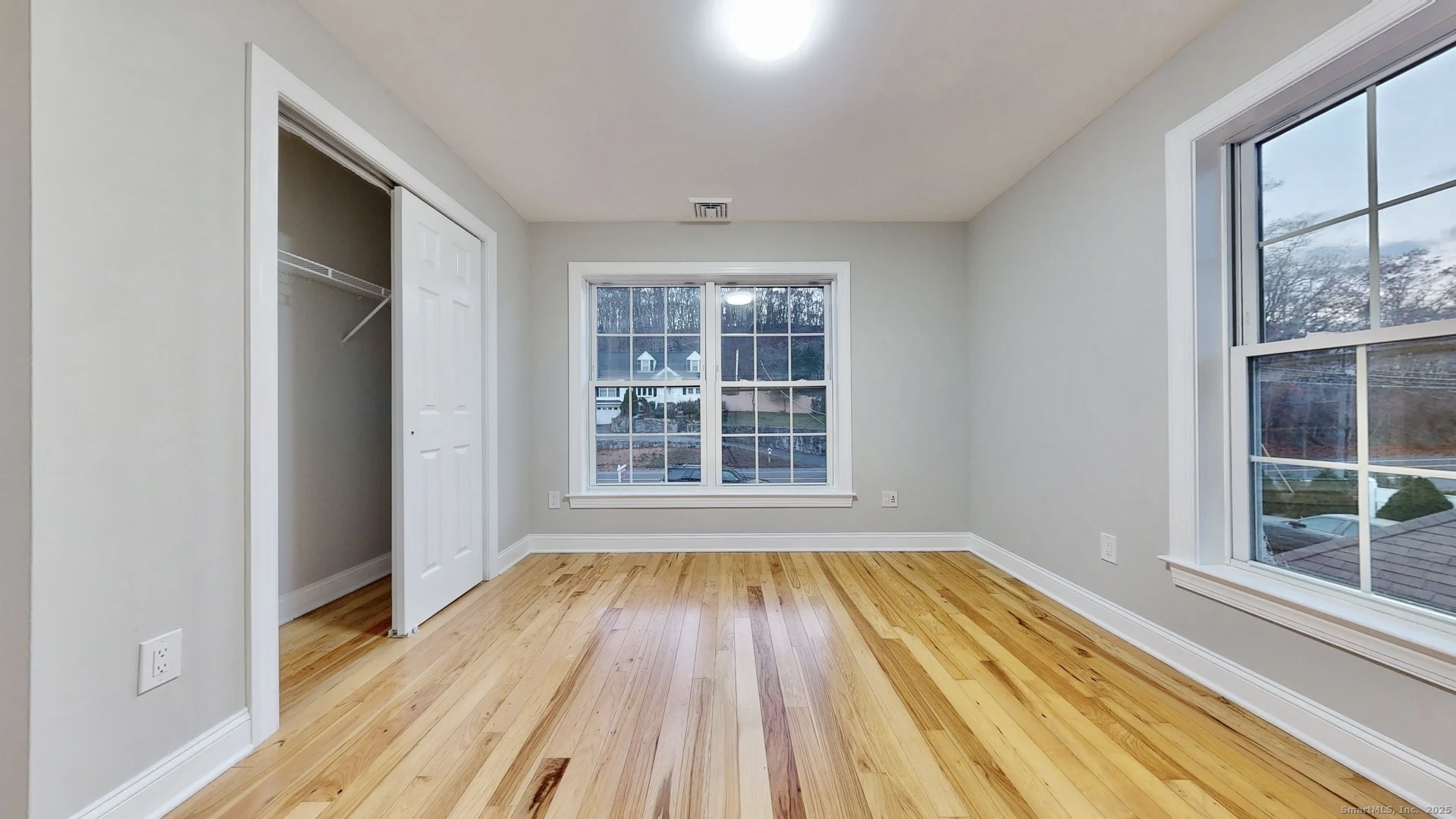 112 River Road Shelton, CT 06484 - Photo 25 of 37 a view of wooden floor in a room next to a window