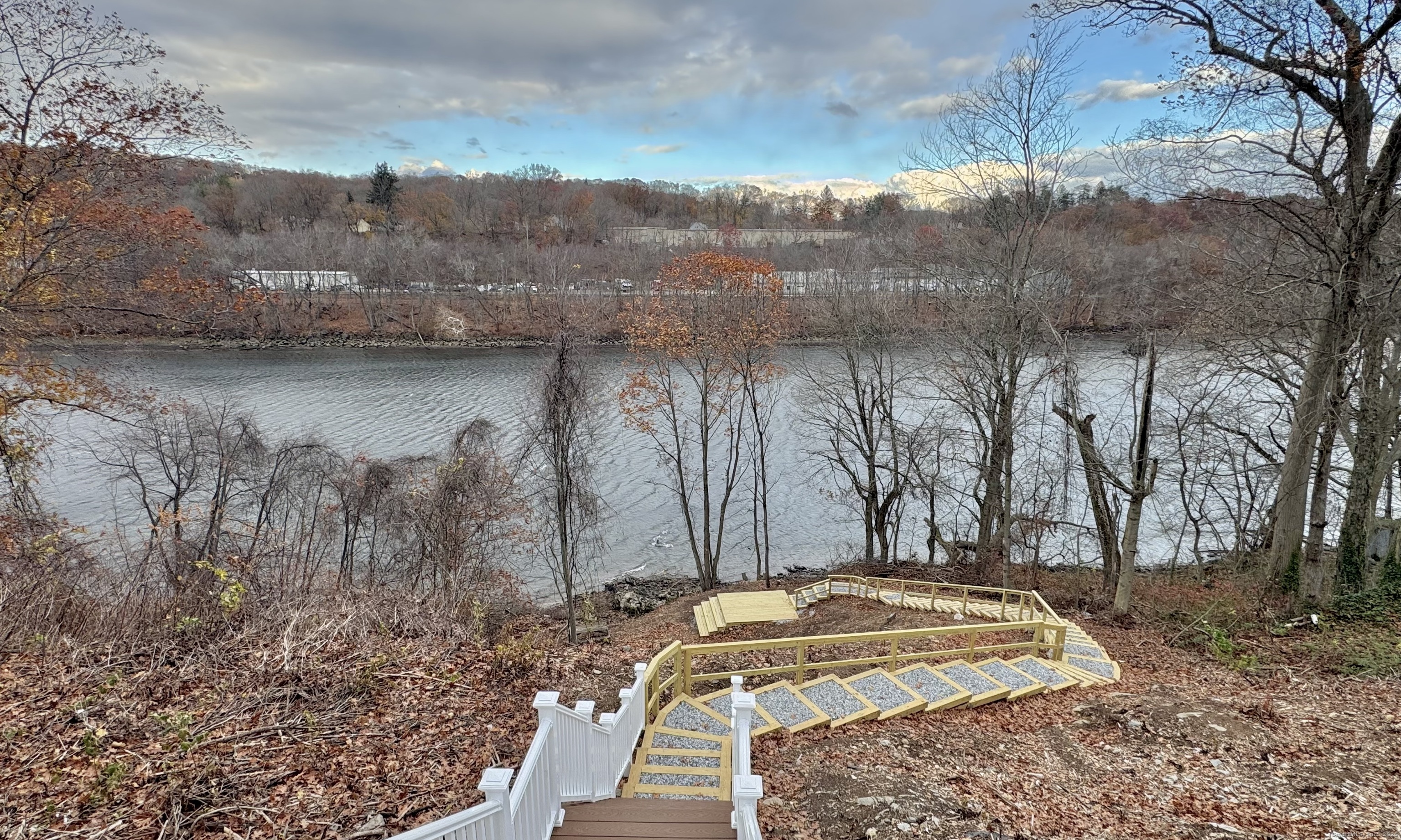 112 River Road Shelton, CT 06484 - Photo 3 of 37 a view of a yard with wooden fence
