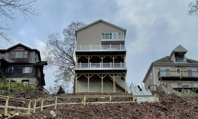 a front view of a house with balcony